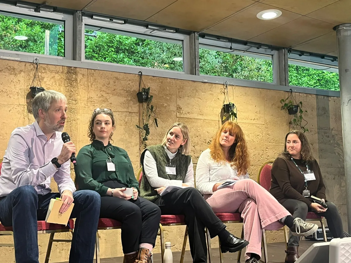 Rufus Curnow speaking on a panel at the Cornwall AI Summit at the Eden Project