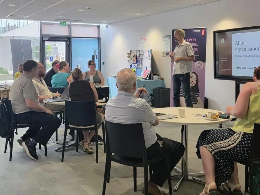 Rufus Curnow speaking to local business owners at Tameside Talks Business